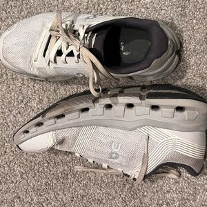 On Cloud Running Cream and Gray Athletic Shoes